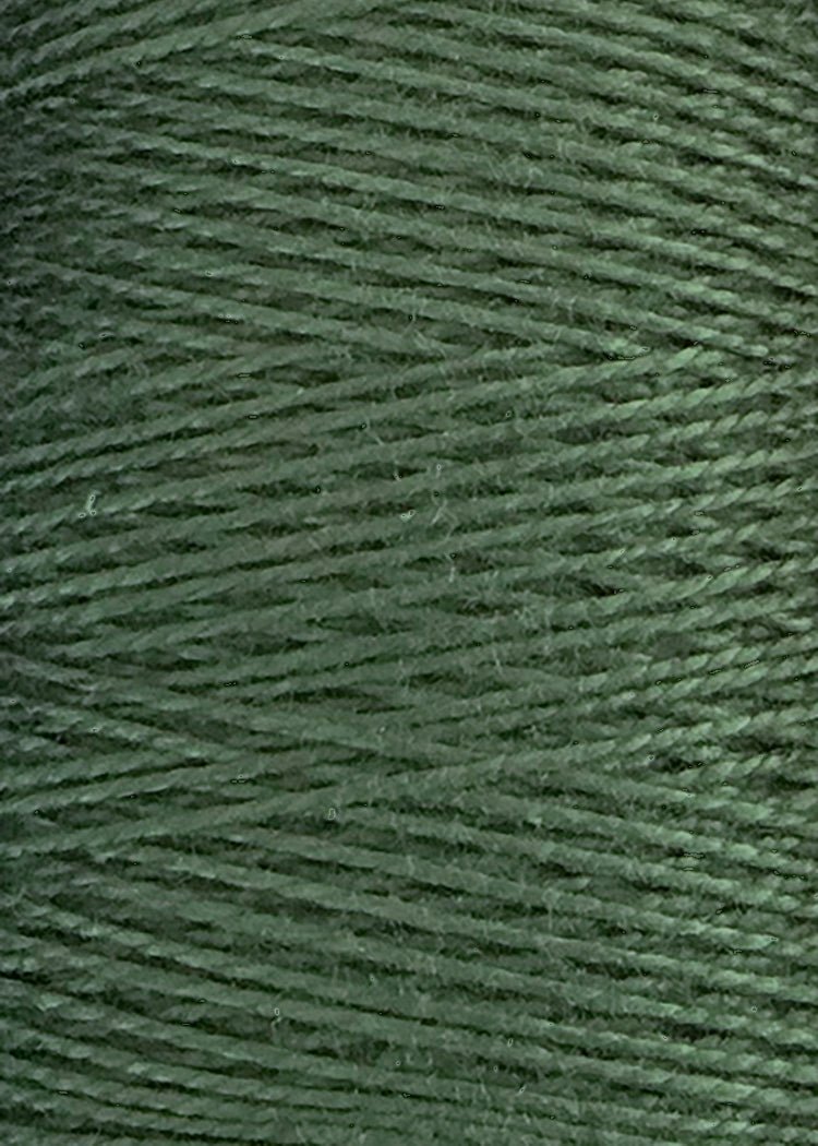 Close-up of tightly wound olive green 10/2 Looma Circulo Mercerized Pearl Cotton Yarn by Circulo, showing the texture and individual strands wrapping diagonally across the large cone.