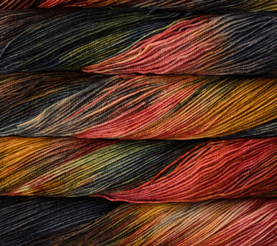 Four stacked hanks of Malabrigo Sock kettle-dyed yarn in shades of dark purple, forest green, amber, and terracotta.