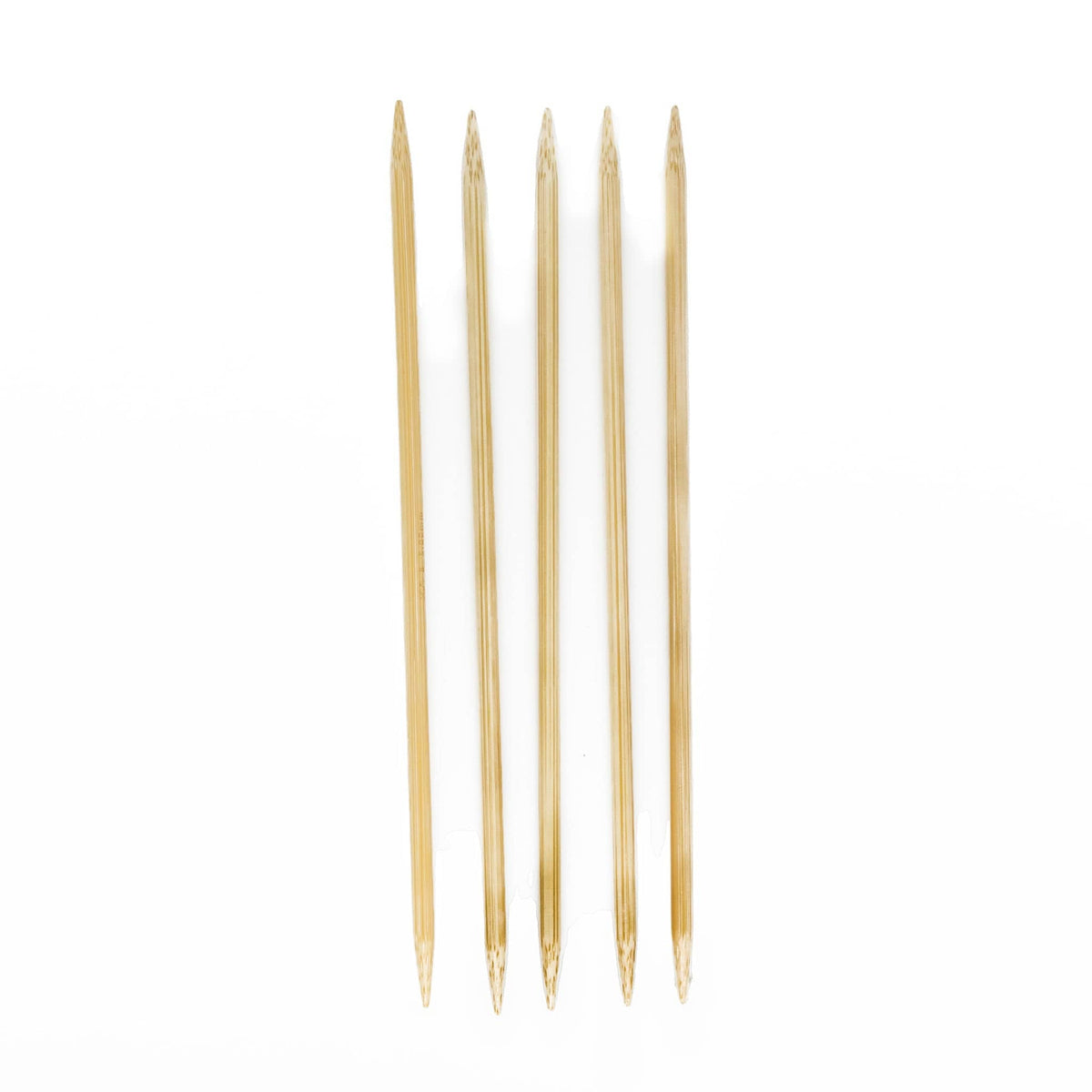 Five N. Jefferson Double-Point Bamboo Knitting Needles, 8", are arranged vertically on a white background, showing their pointed tips facing upward and smooth polished finish.