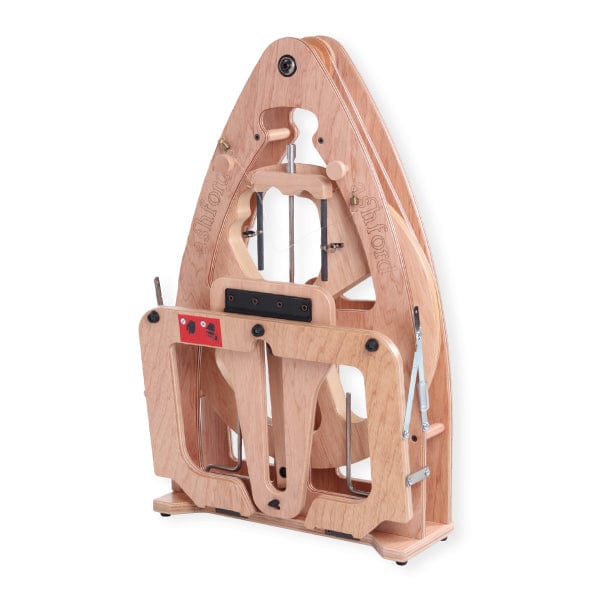 A wooden sock knitting machine pairs well with the Ashford Joy 2 Spinning Wheel from Ashford Handicrafts Limited, making fiber prep efficient; the spinning wheel comes with a carry bag for easy transport.