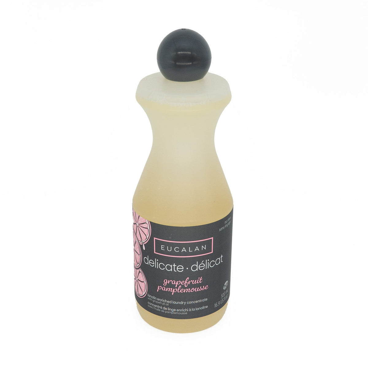 A 16.9 oz (500 ml) bottle of Eucalan Wool Wash by Eucalan in grapefruit scent, with a black label featuring pink grapefruit illustrations and a black cap, displayed against a white background.