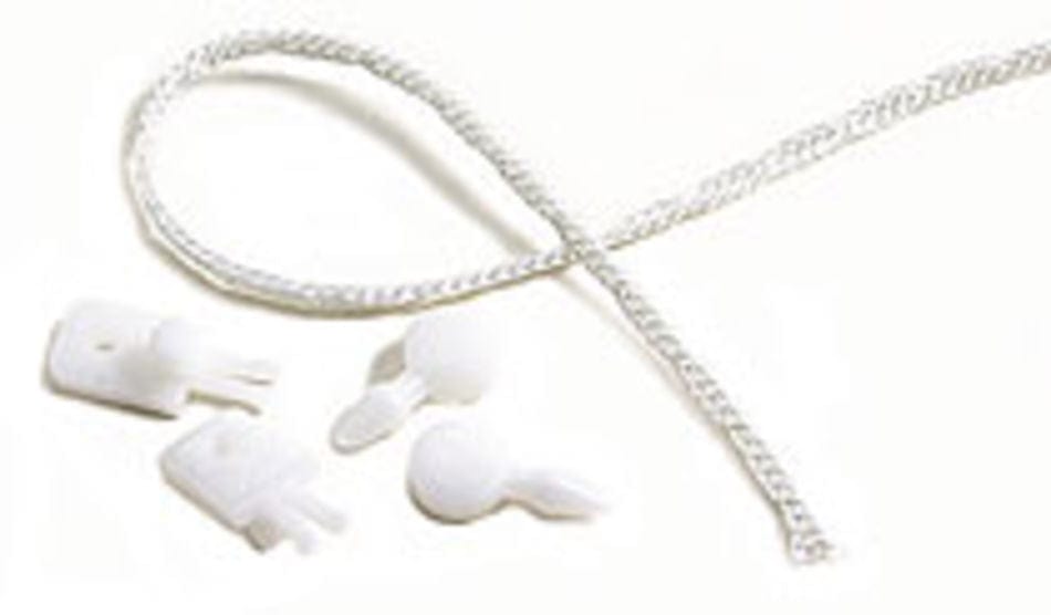 Displayed on a white surface are components from the Glimakra Texsolv Tie-Up Kits: a white polyester loop cord and four small white plastic cord locks, designed for efficient loom tie-up.