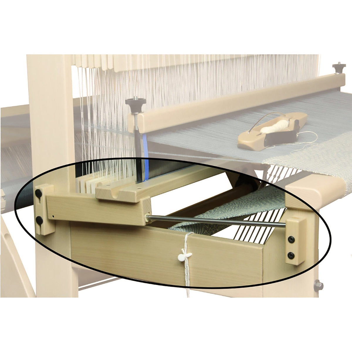 A Louët Sliding Beater for David Looms from Louet Inc. is equipped for weaving, with highlighted warp and weft threads. The overhead beater ensures smooth operation, while a shuttle with thread is ready on the loom.