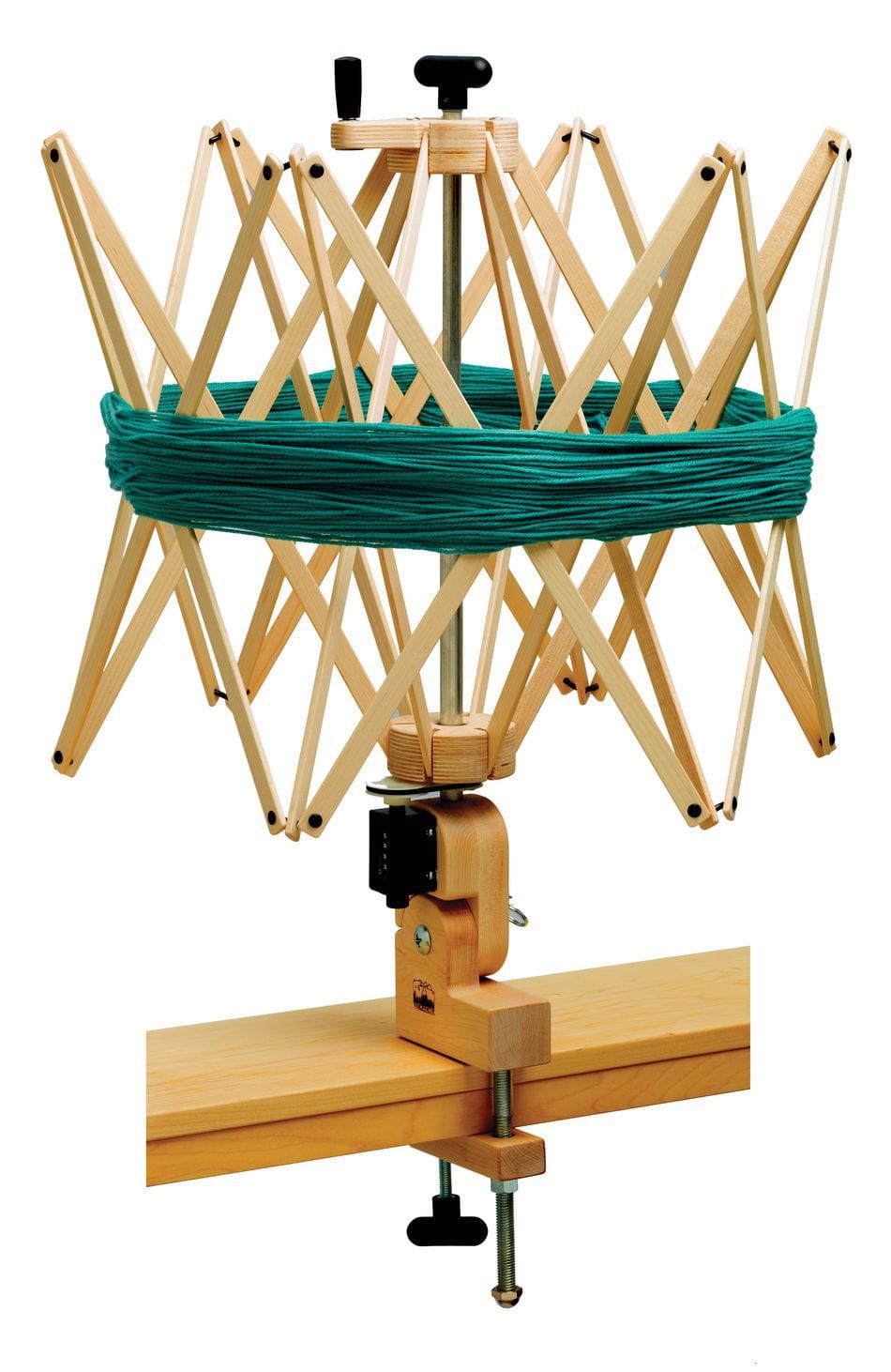 The Schacht Spindle Co. Ultra Umbrella Swift, temporarily out of stock, features an expandable wooden design to hold a teal skein of yarn and securely clamps to your table or work surface.