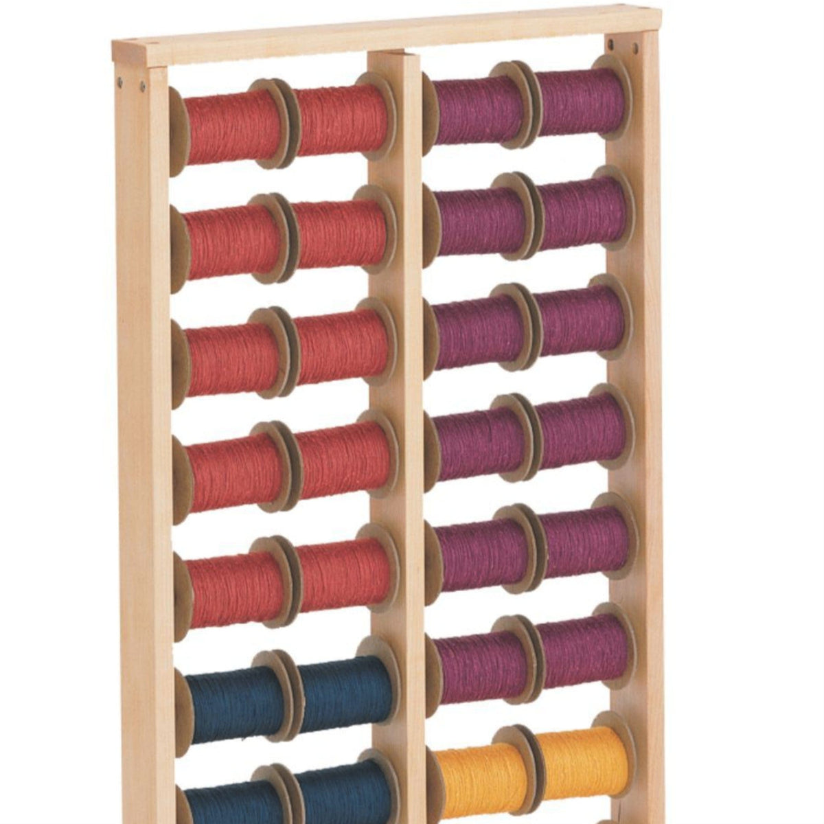 The Schacht Spool Rack by Schacht Spindle Co. holds multiple spools of colored thread, neatly arranged in rows—perfect for sectional warping or as a yarn holder.