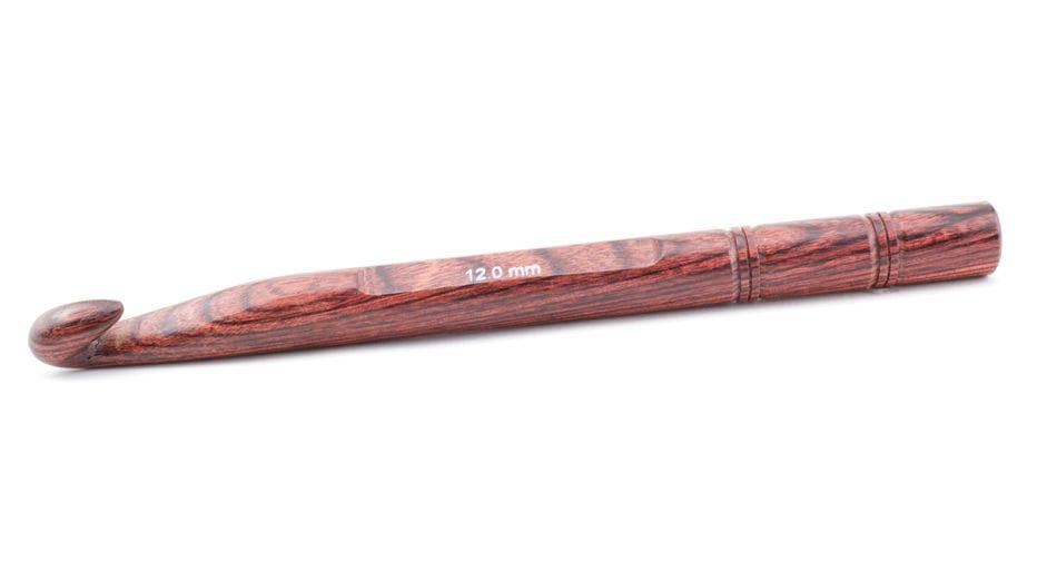The Knit Pro (Knitters Pride) Dreamz Wooden Crochet Hook by Accessories Unlimited is a 12.0 mm polished wood hook with decorative grooves near the handle, offering a smooth, comfortable crafting experience.