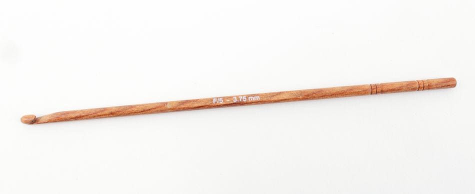 A Knit Pro (Knitters Pride) Dreamz Wooden Crochet Hook by Accessories Unlimited, size F5 - 3.75 mm, rests on a plain white background.