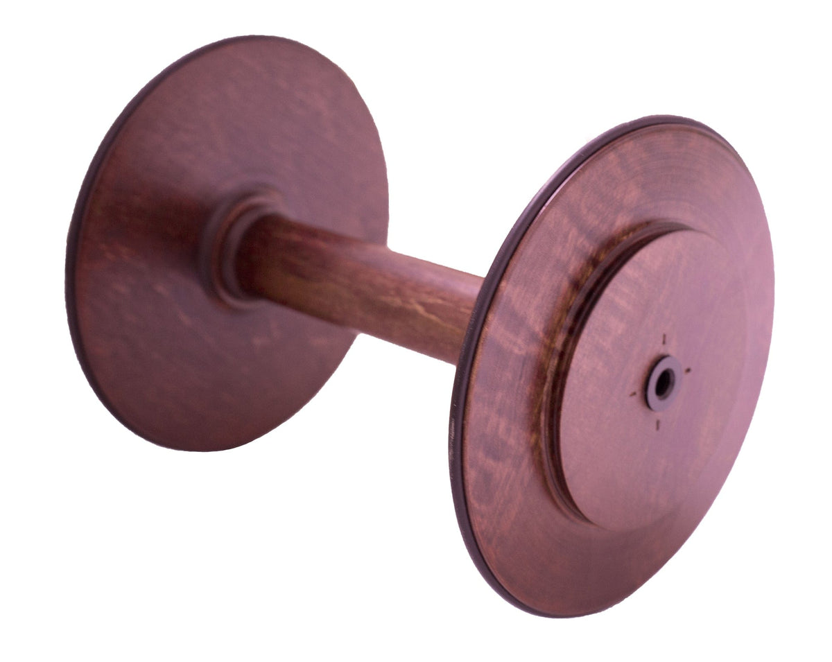 Kromski North America’s Kromski Spinning Wheel Bobbins are large, empty wooden spools with circular ends, perfect for holding thread or wire; shown on a white background.