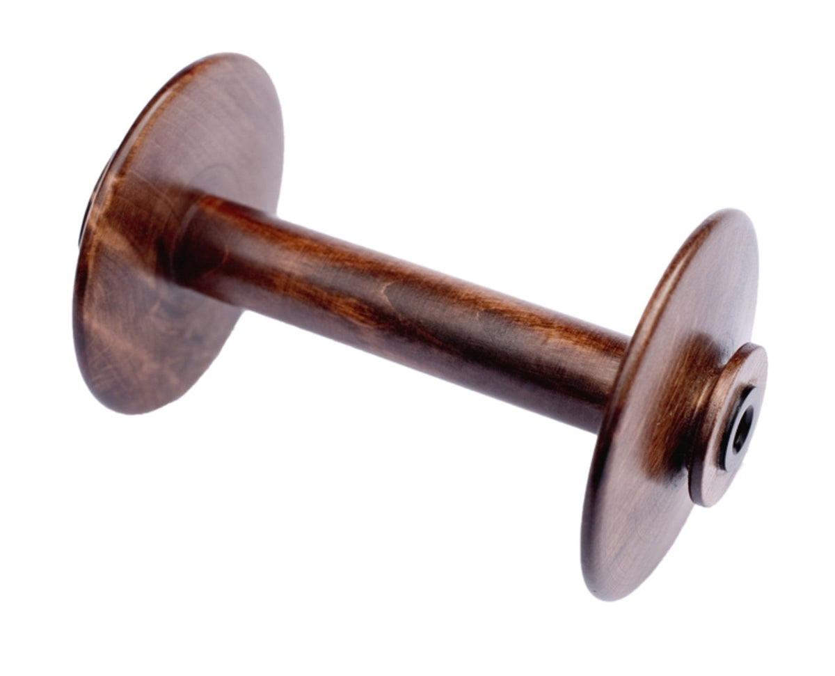A Kromski North America Spinning Wheel Bobbin, featuring a cylindrical center with two wide flared ends, is shown against a white background.