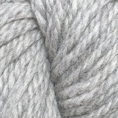Close-up of Halcyon Yarn Classic Rug Wool | Strand by Caledonian Dye Works—light gray skein with thick, soft fibers twisted together, highlighting the detailed texture. Ideal wool for rug weaving projects.