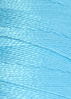 Close-up of tightly wound, shiny light blue thread on a large cone of Circulo 10/2 Looma Mercerized Pearl Cotton Yarn, highlighting the individual strands and smooth texture of this premium weaving yarn.