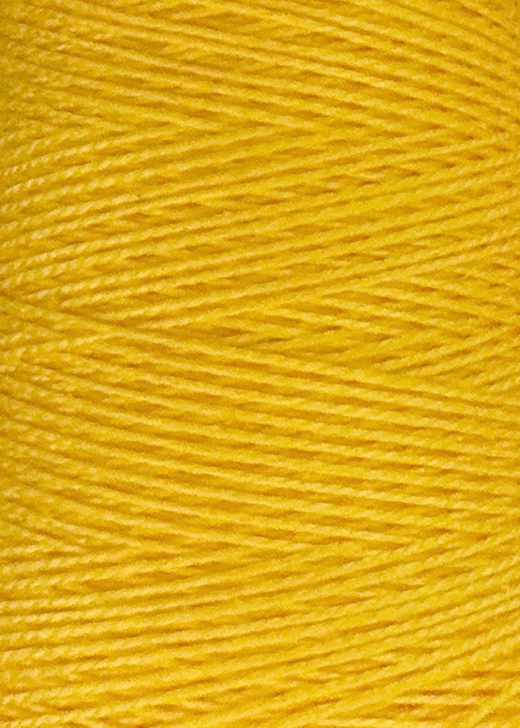 A close-up of vibrant yellow 3/2 Looma Circulo Mercerized Pearl Cotton Yarn | Large Cone by Circulo shows the yarn tightly wound in parallel layers, creating a textured surface with visible fibers. This Pearl cotton is Oeko-Tex certified for quality and safety.