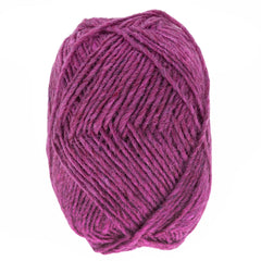 A close-up of a skein of magenta Berroco, Inc. Léttlopi (Lite Lopi) Icelandic Wool Yarn, tightly wound in an oval shape against a white background, highlights its unique texture—ideal for colorwork knitting projects.