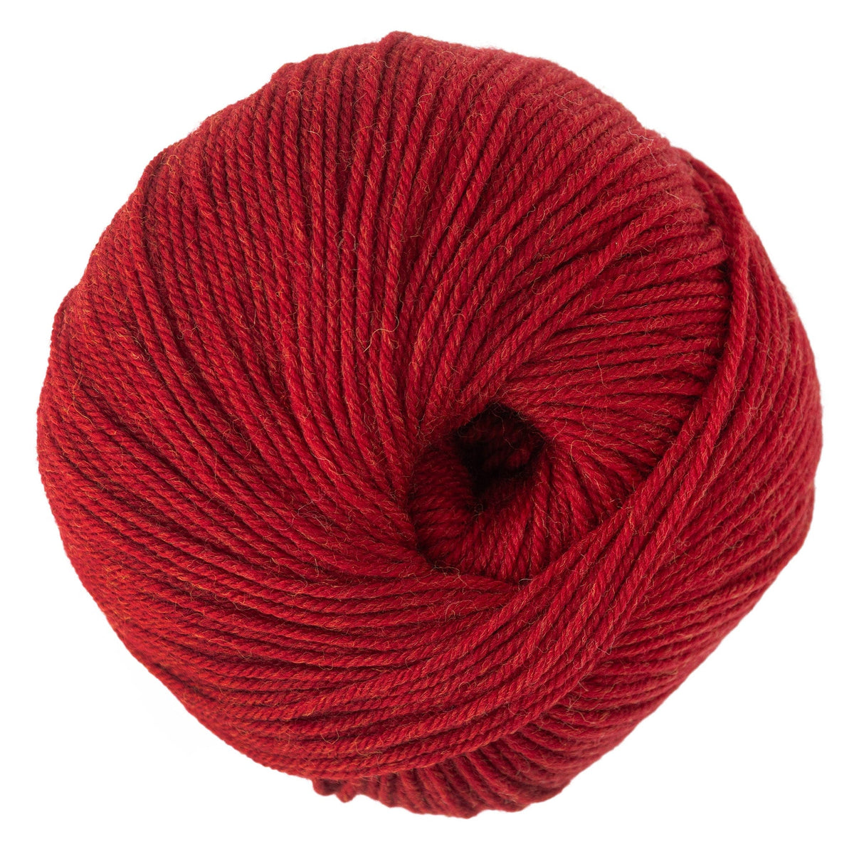 Cascade Yarns' Cascade 220 Superwash Wool Yarn is a DK weight yarn wound tightly in a circular shape, with visible strands and a small hollow center.