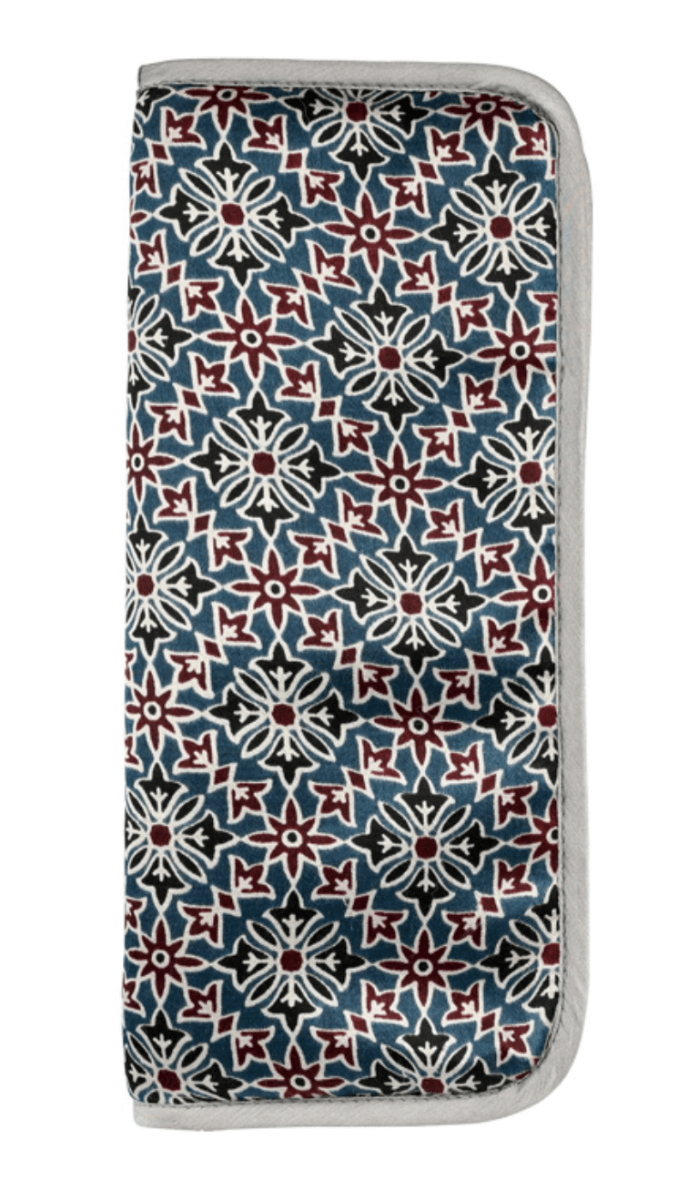 The Lantern Moon Circular Needle Case by Bryson Distributing, Inc. is a rectangular IKAT fabric case with a geometric floral pattern in black, white, blue, and red and light gray trim, shown against a white background.