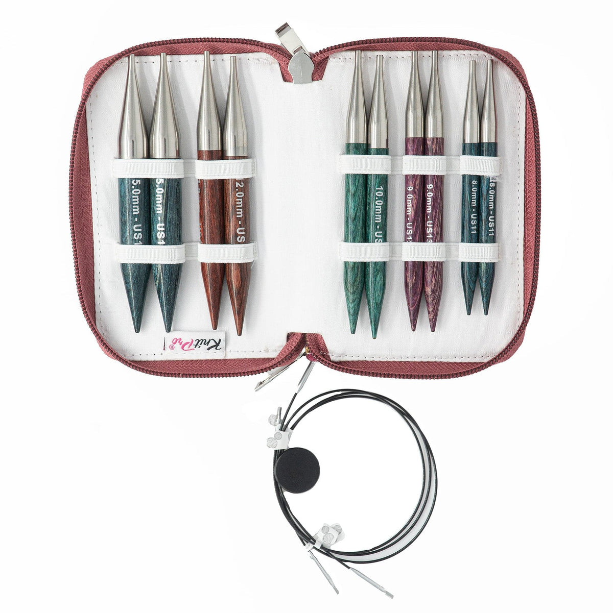 The Accessories Unlimited Knit Pro Dreamz Interchangeable Circular Knitting Needle Set includes an open zippered case with 6 colorful wooden tips, 3 black cables with metal ends, and tightening keys for versatile knitting.