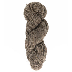 A skein of Bartlettyarns Maine Wool Yarn (Fisherman 2-Ply) by Bartlettyarns, featuring thick, textured brownish-gray fibers, is twisted into a loop and displayed on a plain white background.