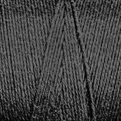 Close-up of tightly wound dark gray Cotton Carpet Warp 8/4 by Great Northern Weaving, highlighting the texture and pattern of the overlapping cotton fibers.