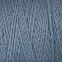 Close-up of light blue Cotton Carpet Warp 8/4 by Great Northern Weaving, highlighting the visible strands, fibers, and textured weave of this 4-ply cotton yarn.