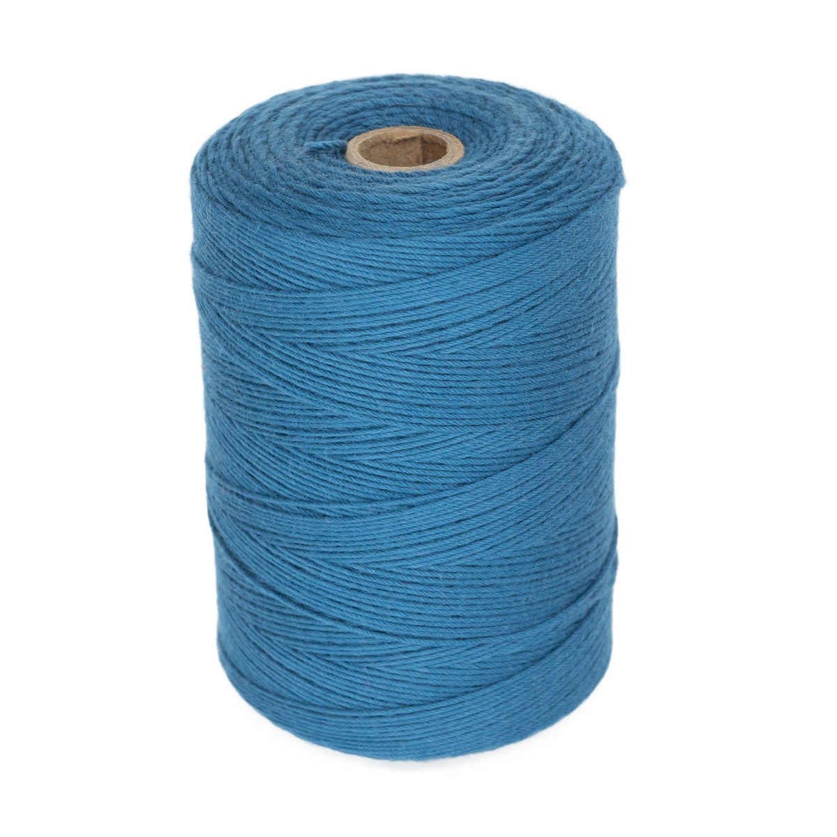 A large spool of Great Northern Weaving Cotton Carpet Warp 8/4 in blue is neatly wound around a cylindrical cardboard core and stands upright on a white background.