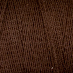 Close-up of Great Northern Weaving Cotton Carpet Warp 8/4 shows tightly wound, soft 4-ply cotton fibers and diagonal patterns—ideal as colorfast yarn for rug making.