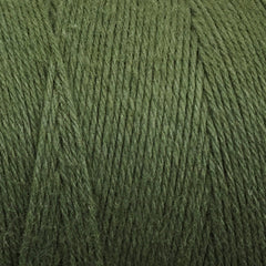 Close-up of Great Northern Weaving Cotton Carpet Warp 8/4 in olive green, highlighting the tightly wound, fibrous 4-ply cotton strands ideal for rug making.