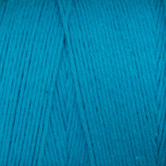 Close-up of Great Northern Weaving's Cotton Carpet Warp 8/4 in bright blue, displaying tightly wound 4-ply cotton strands and the texture of colorfast fibers.
