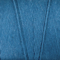Close-up of Great Northern Weaving Cotton Carpet Warp 8/4 in blue, showcasing the texture and tightly wound 4-ply cotton fibers.