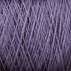 Close-up view of soft, purple Newport 16/2 Linen Yarn Mini-cone strands by Halcyon Yarn, overlapping and crisscrossing to highlight the texture and fibrous detail of the material.