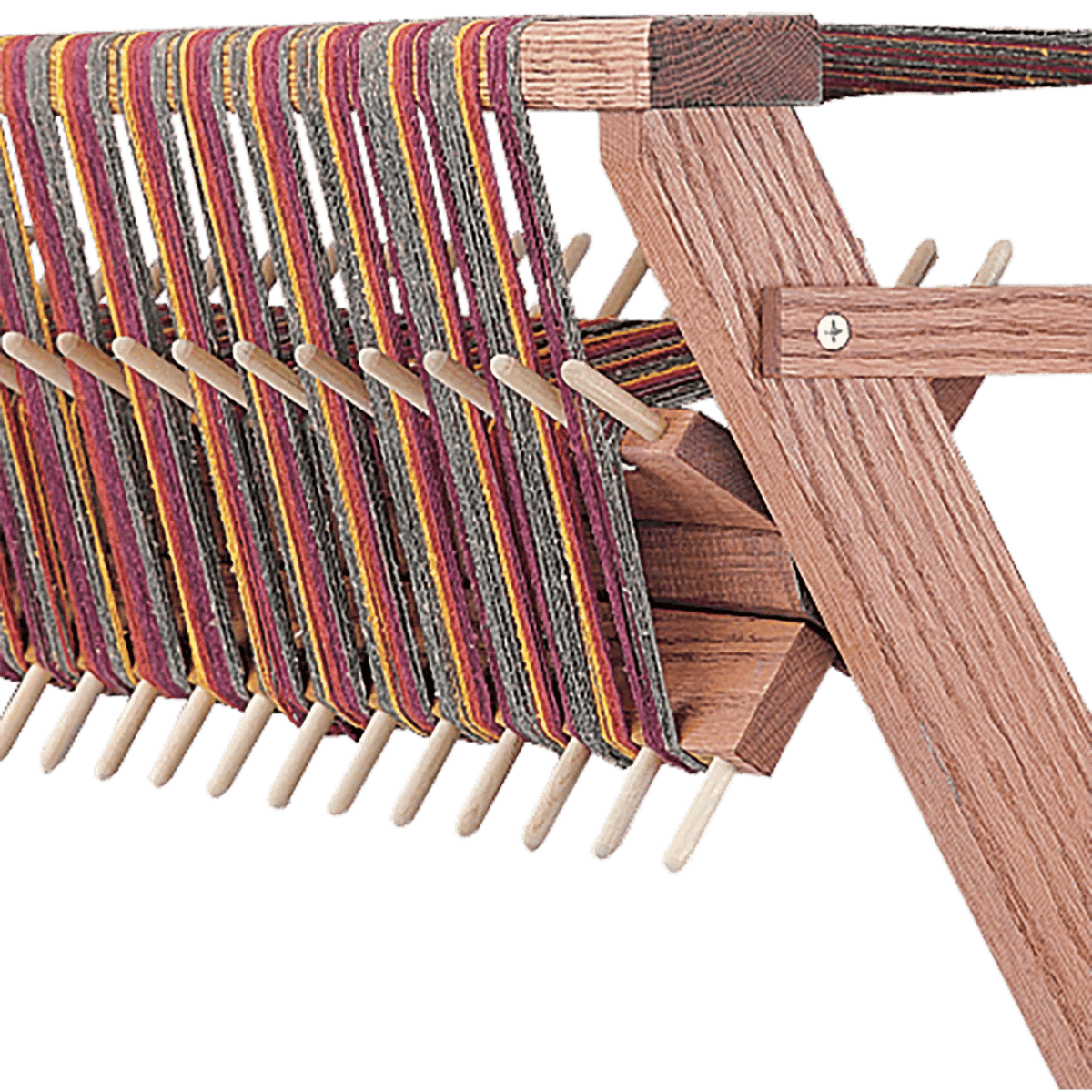 A close-up of the Schacht Sectional Warp Beam for Standard Floor Loom by Schacht Spindle Co., showing colorful threads on the wooden frame and clearly visible pegs. Temporarily out of stock with Schacht.