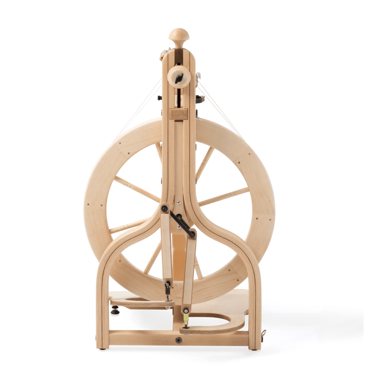 The Schacht Matchless Spinning Wheel by Schacht Spindle Co. is shown from the front, highlighting its hardwood frame, large circular wheel, spindle, and double treadle design against a white background.