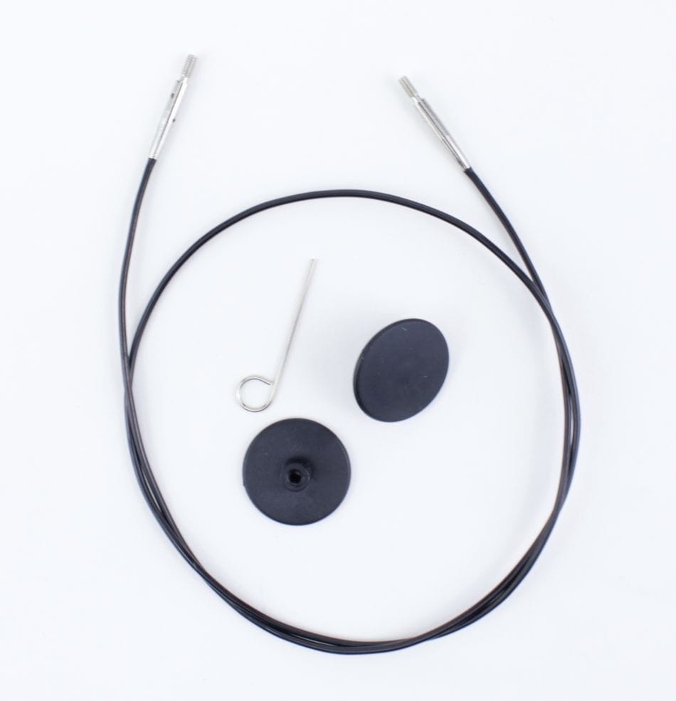 A Knit Pro (Knitters Pride) Interchangeable Circular Needle Cord for Dreamz and Nova by Accessories Unlimited, shown with metal ends, black end caps, and a small hook tool on a white background, similar to bicycle brake cable sets.