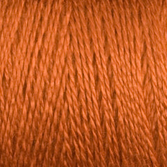 Close-up of Maurice Brassard 8/2 Tencel Yarn on a mini-cone in vibrant orange, showcasing its twisted threads and fibrous texture—ideal for adding bold color to your weaving projects.