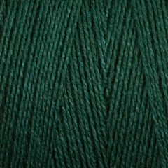 Close-up of Maurice Brassard 8/2 Tencel Yarn | Mini-cone in dark green, highlighting the soft, slightly fuzzy cellulose fibers and tightly wound strands—ideal for detailed weaving projects.